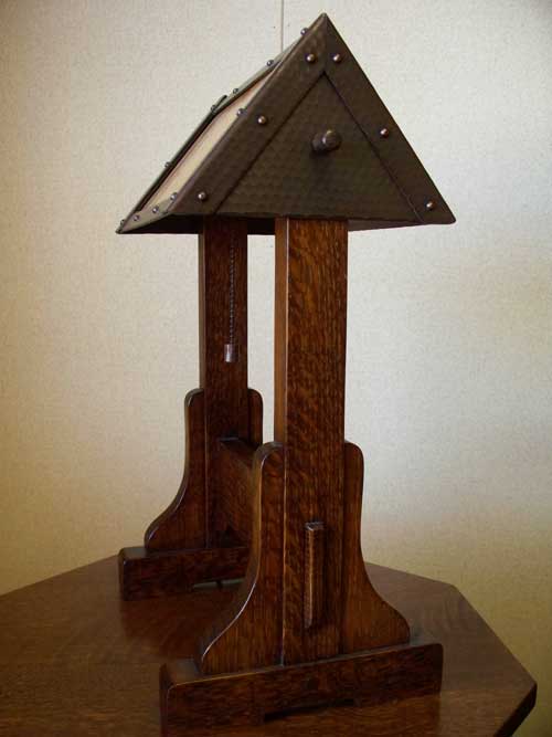 arts and crafts stickley reproduction style table lamp of stained quartersawn oak with hand crafted art glass with adjustable hand hammered copper shade