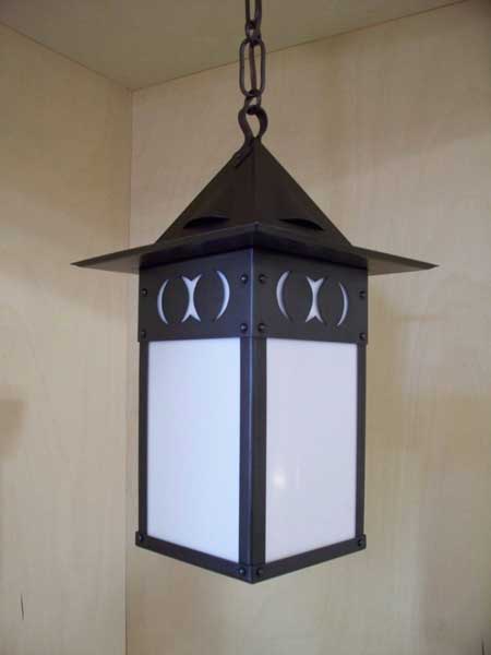 Stickley style lantern with hammered copper and art glass
